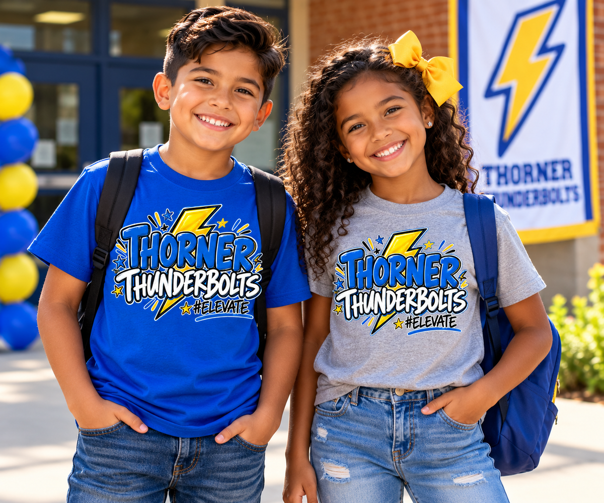 Boy and girl wearing blue and gray Thorner Thunderbolts #ELEVATE youth school spirit shirts outside a school.